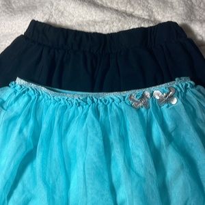 Girls size 6 skirts with shorts